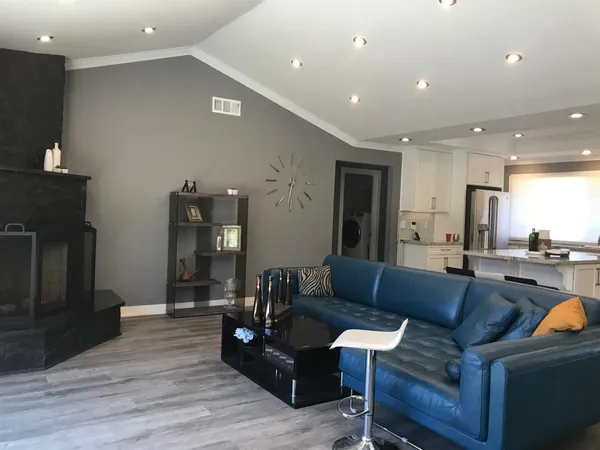 a living room with furniture and window