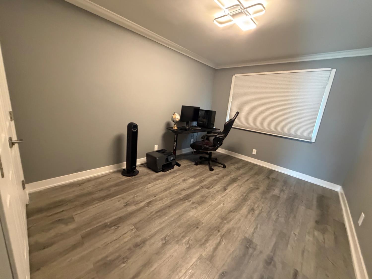 4448 Hackberry Lane Carmichael, CA 95608 - Photo 43 of 64 a workspace with wooden floor and a window