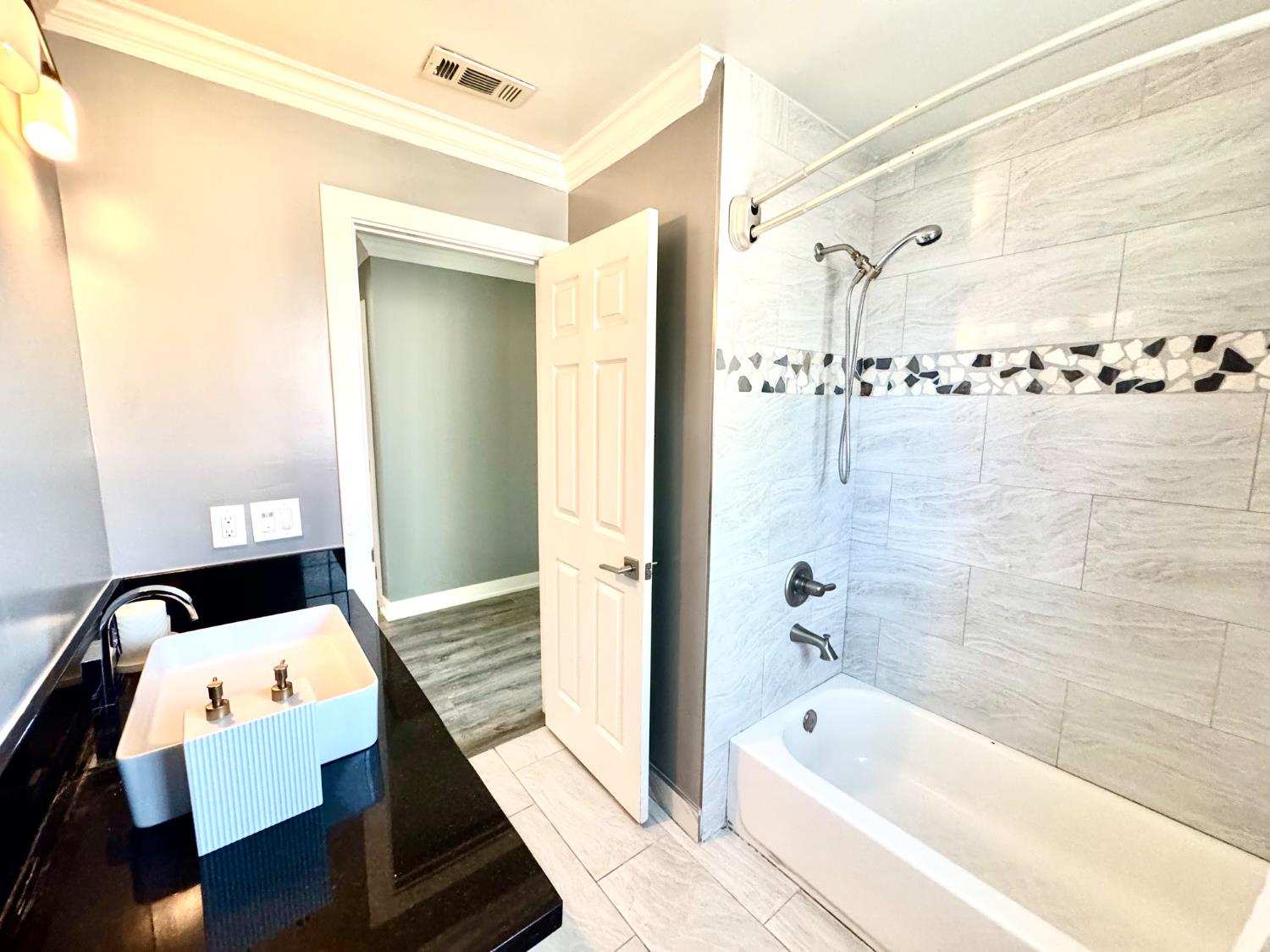 4448 Hackberry Lane Carmichael, CA 95608 - Photo 51 of 64 a bathroom with a bathtub and a shower