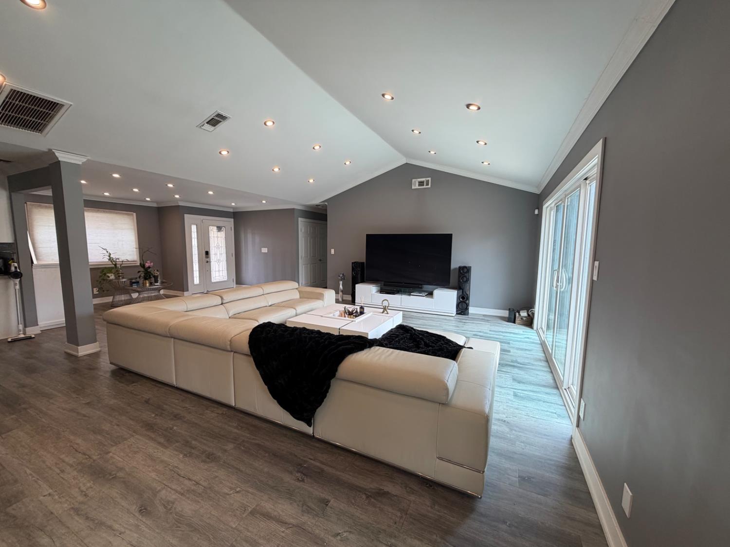 4448 Hackberry Lane Carmichael, CA 95608 - Photo 7 of 64 a living room with furniture and a flat screen tv