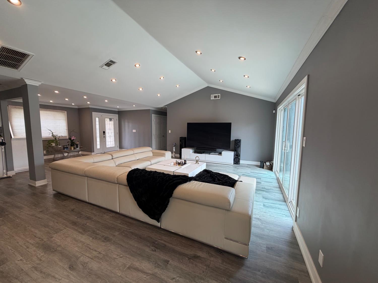 4448 Hackberry Lane Carmichael, CA 95608 - Photo 8 of 64 a large bedroom with a bed and a large mirror