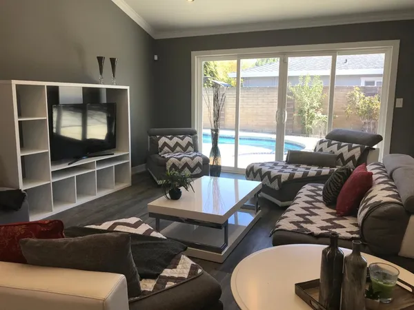 a kitchen with a table and chairs