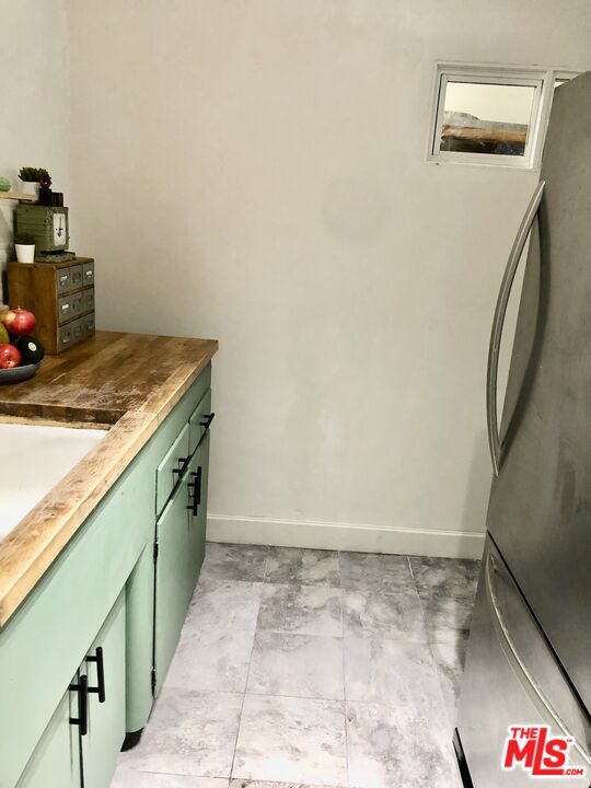 815 Pacific Avenue, Unit 9 Long Beach, CA 90813 - Photo 12 of 25 a room with storage and utility