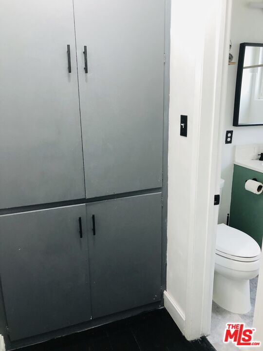 815 Pacific Avenue, Unit 9 Long Beach, CA 90813 - Photo 15 of 25 a bathroom with a toilet and a shower