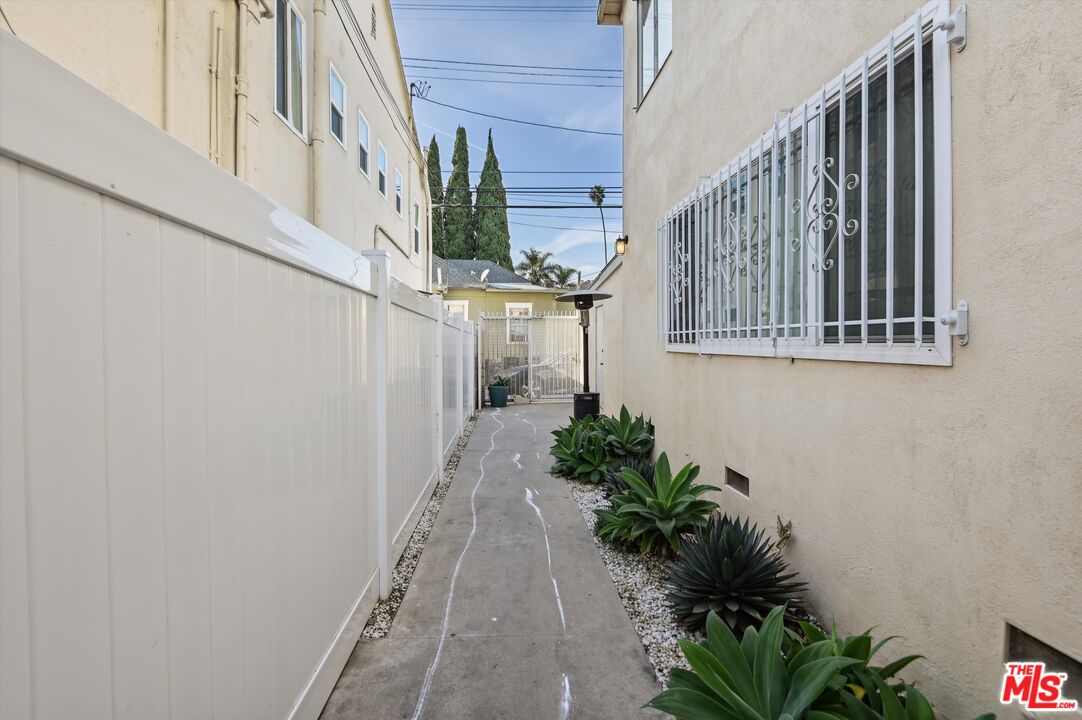 815 Pacific Avenue, Unit 9 Long Beach, CA 90813 - Photo 25 of 25 a view of a house with a flower plants