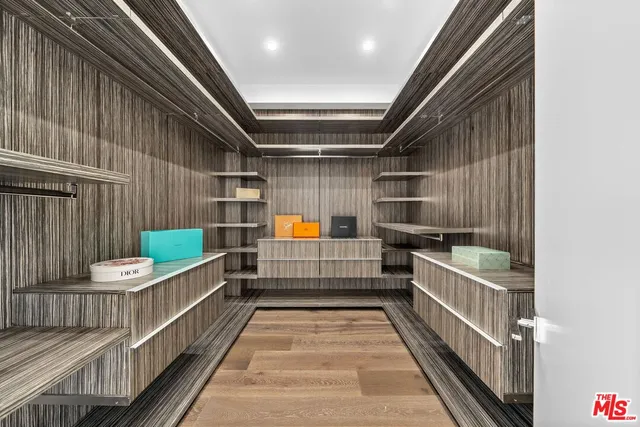 a balcony with table and chairs