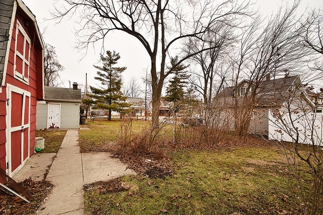 11014 Front Street Mokena, IL 60448 - Photo 2 of 5 a view of a yard covered with snow