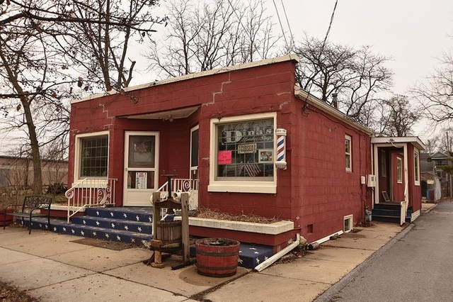 11014 Front Street Mokena, IL 60448 - Photo 4 of 5 a couple of table and chairs in front of a house