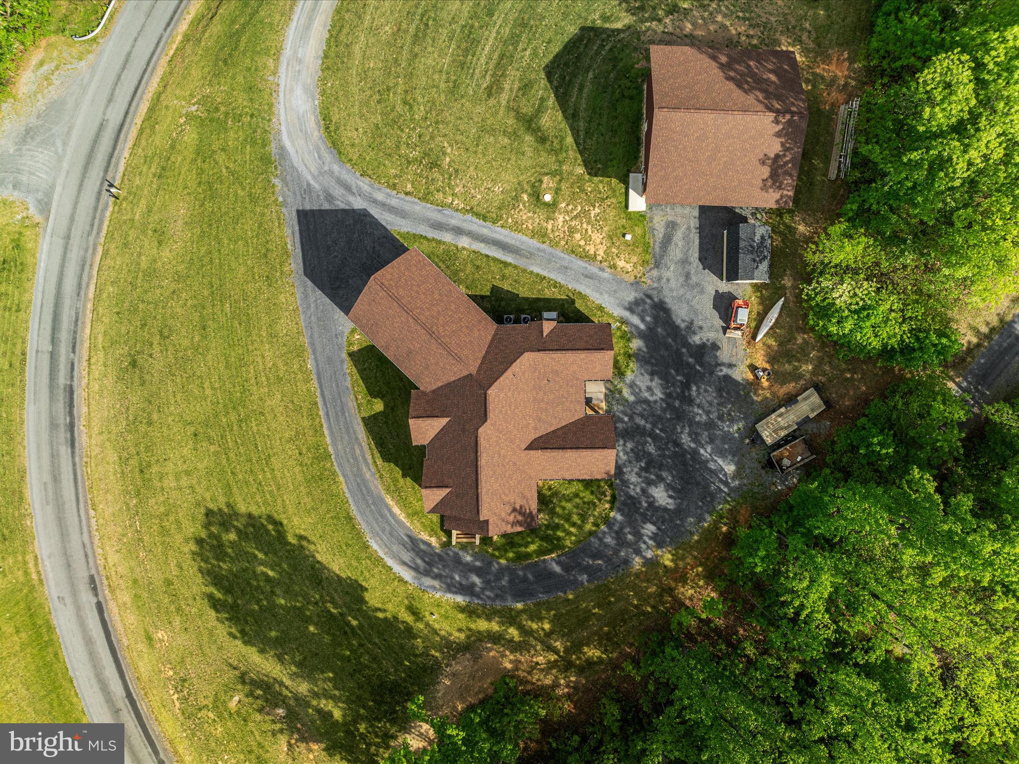 1996 Buck Mountain Road Bentonville, VA 22610 - Photo 56 of 61 an aerial view of a residential house with swimming pool