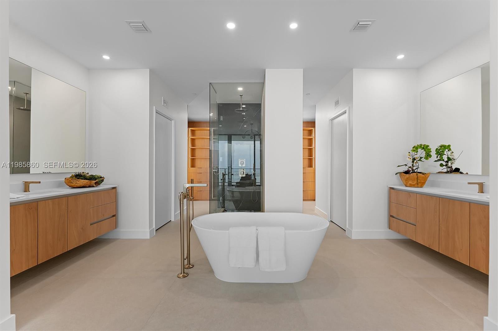 700 Northeast 24th Street, Unit PH5802 Miami, FL 33137 - Photo 15 of 59 a large room with a couch and a refrigerator