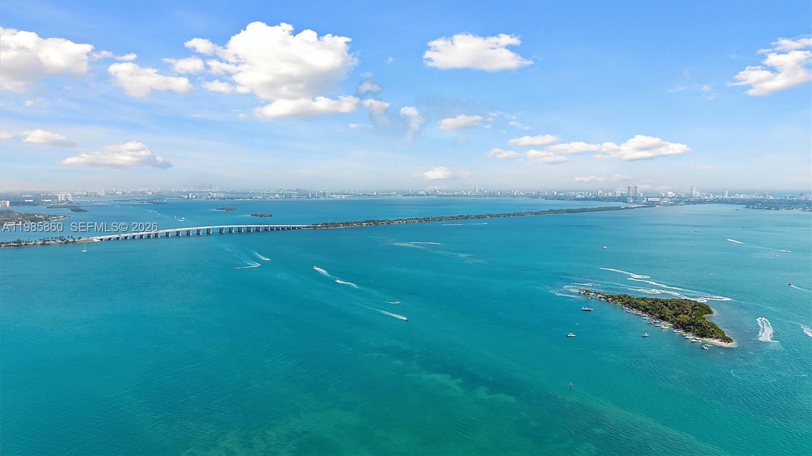 700 Northeast 24th Street, Unit PH5802 Miami, FL 33137 - Photo 44 of 59 a view of a big yard with an outdoor space and seating
