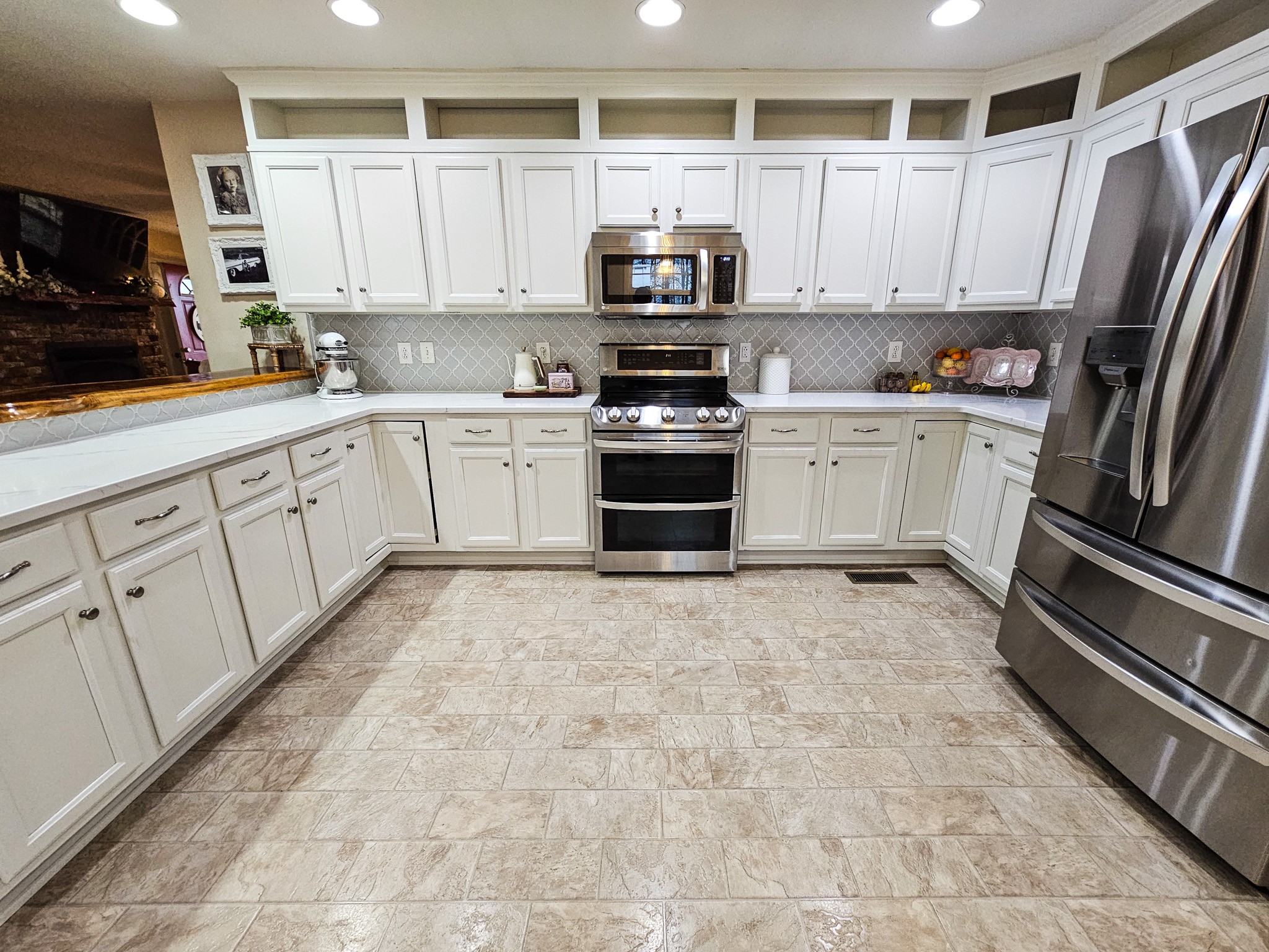 223 Rich Road Unionville, TN 37180 - Photo 14 of 31 a kitchen with granite countertop a refrigerator sink and microwave