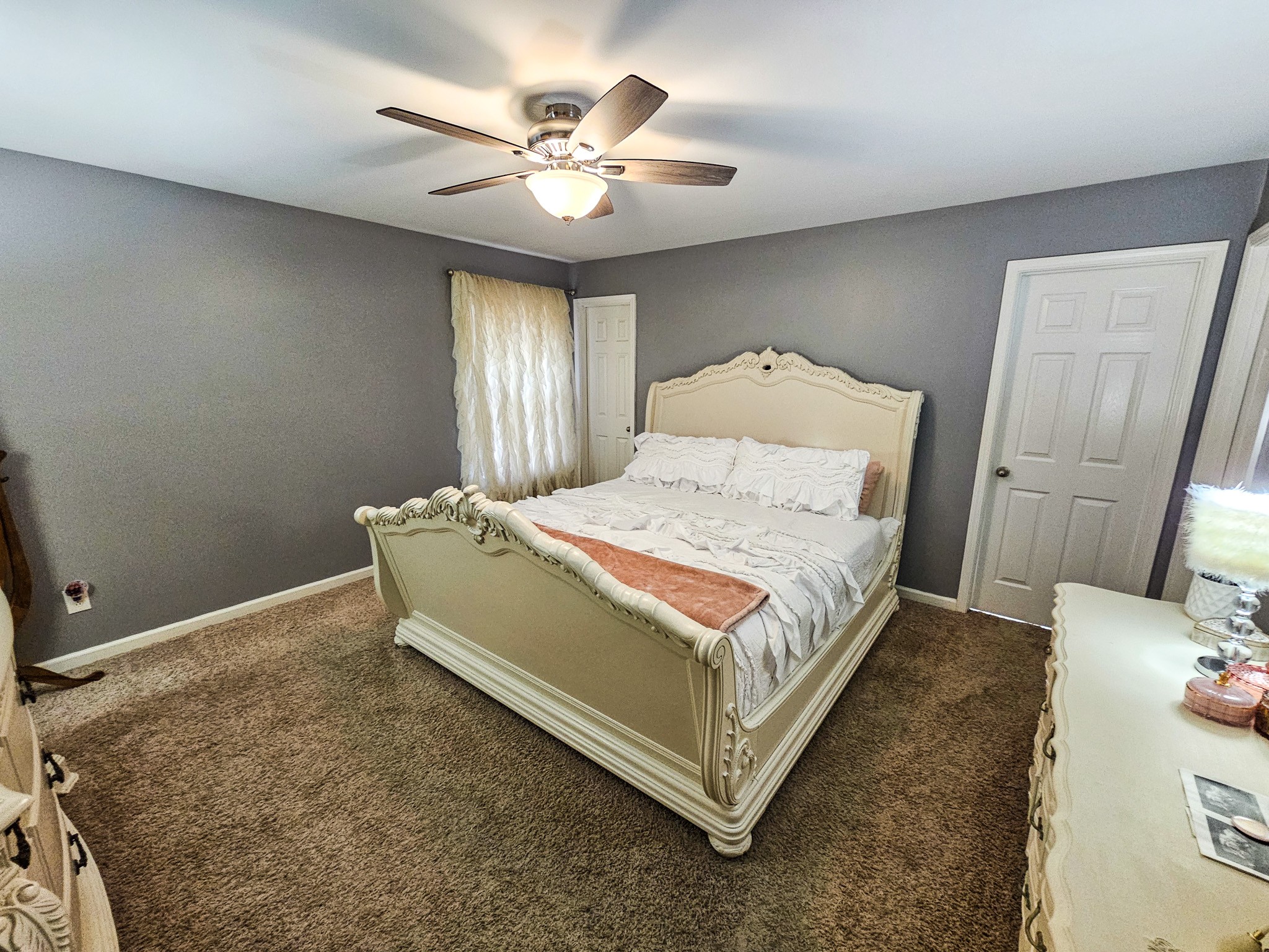 223 Rich Road Unionville, TN 37180 - Photo 17 of 31 a bed sitting in a spacious bedroom next to a window