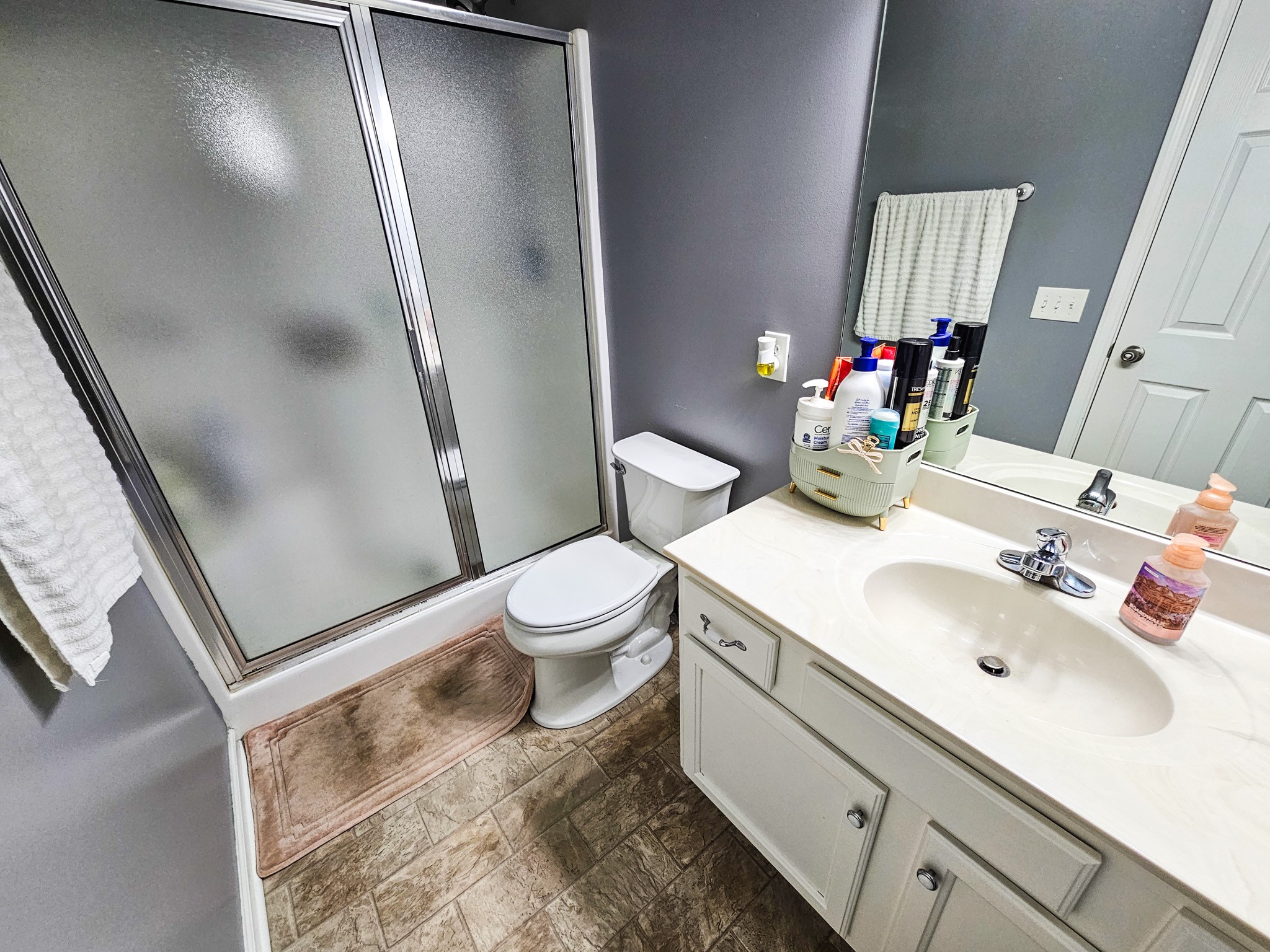 223 Rich Road Unionville, TN 37180 - Photo 19 of 31 a bathroom with a sink toilet and shower