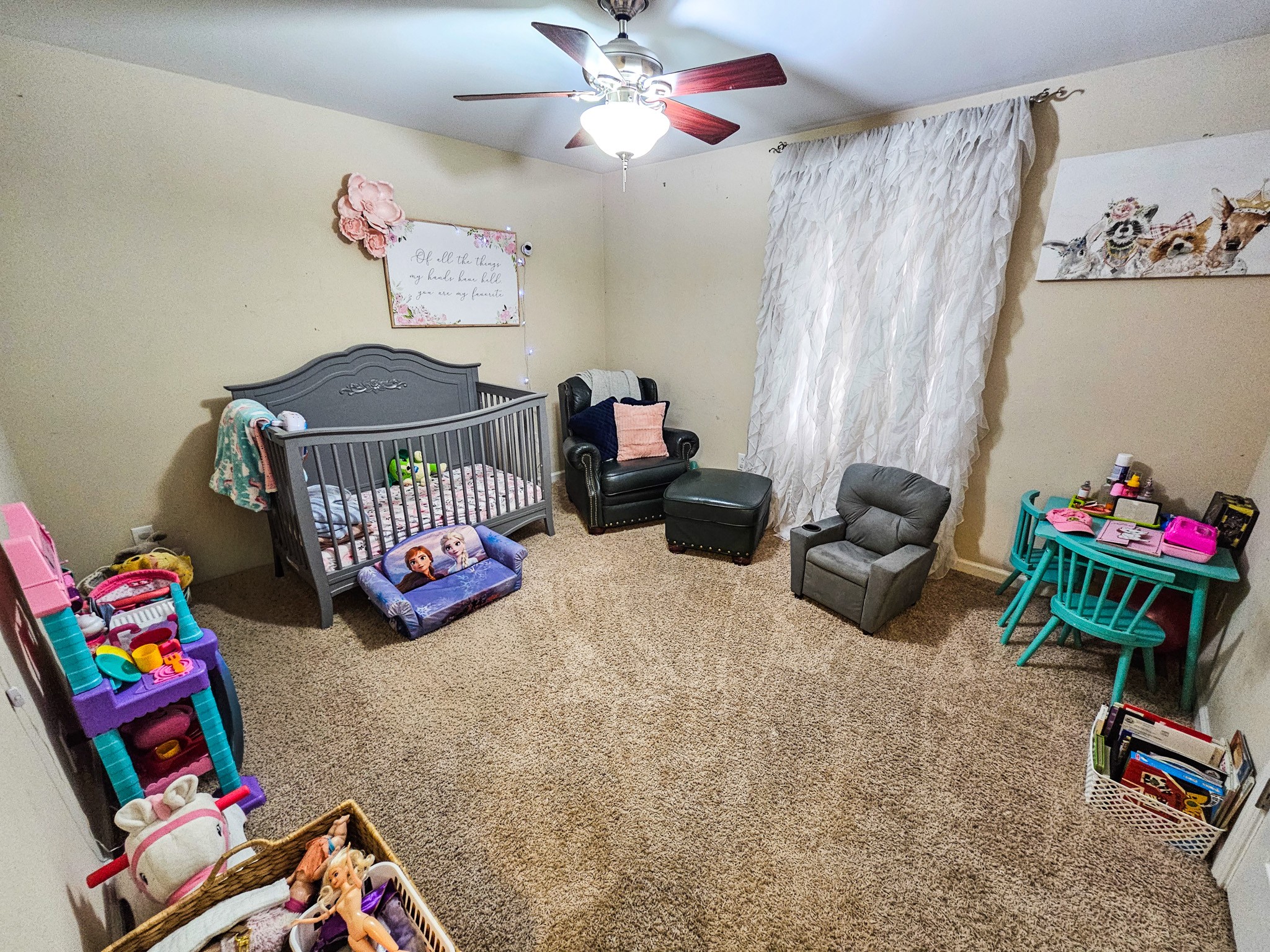 223 Rich Road Unionville, TN 37180 - Photo 25 of 31 a bedroom with furniture toys and a chandelier