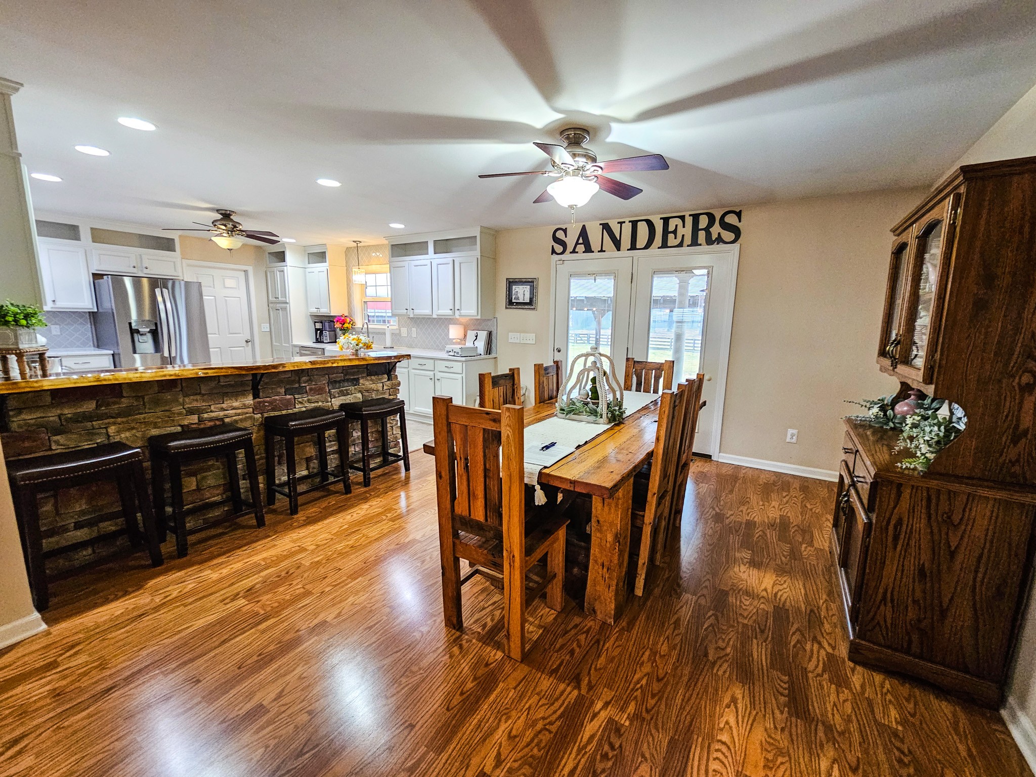 223 Rich Road Unionville, TN 37180 - Photo 7 of 31 a view of a dining room with furniture window and wooden floor