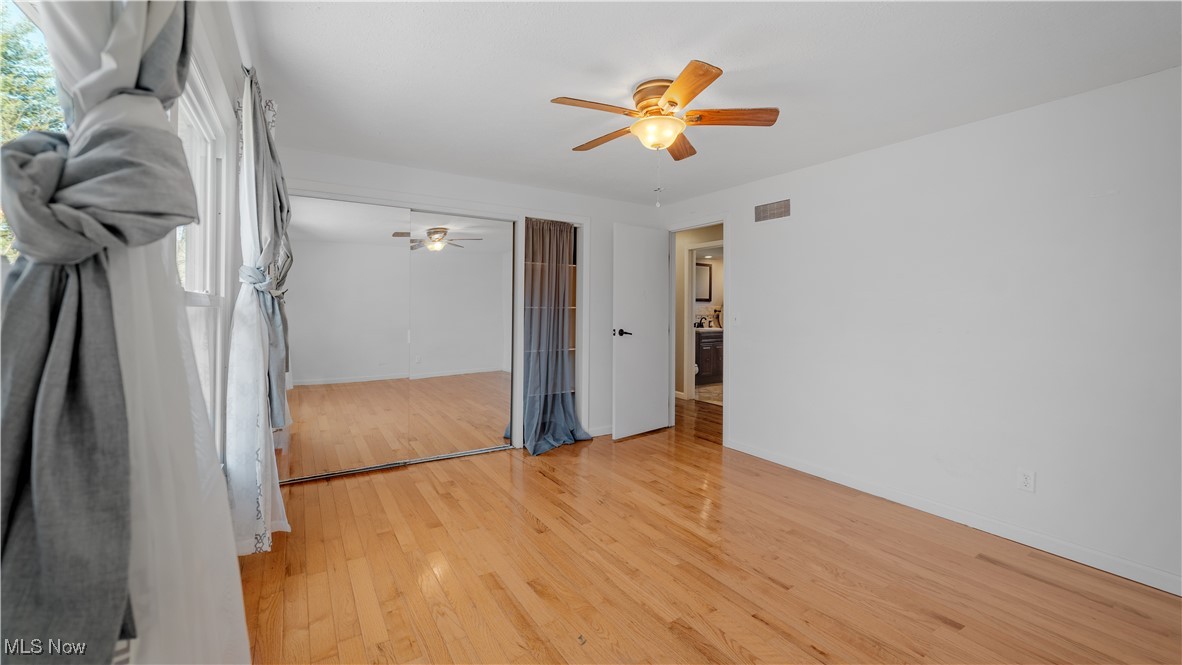 546 Twitchell Road Mansfield, OH 44903 - Photo 21 of 47 Unfurnished bedroom with wood-type flooring, a closet, and ceiling fan
