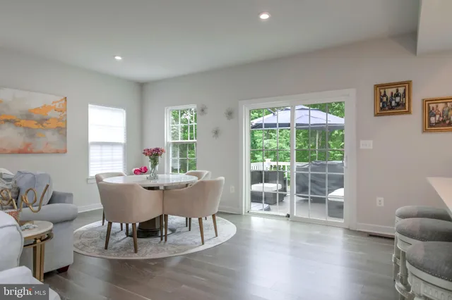 a kitchen with stainless steel appliances a sink and cabinets