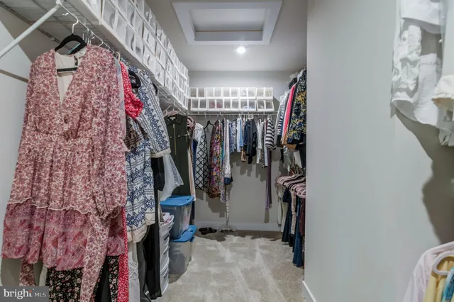 a view of storage and utility room with washer and dryer