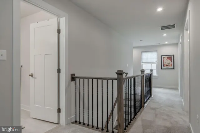 a view of a house with backyard and porch