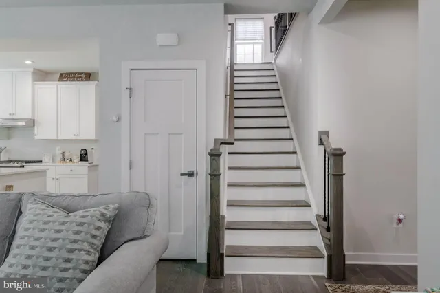 a view of house with backyard