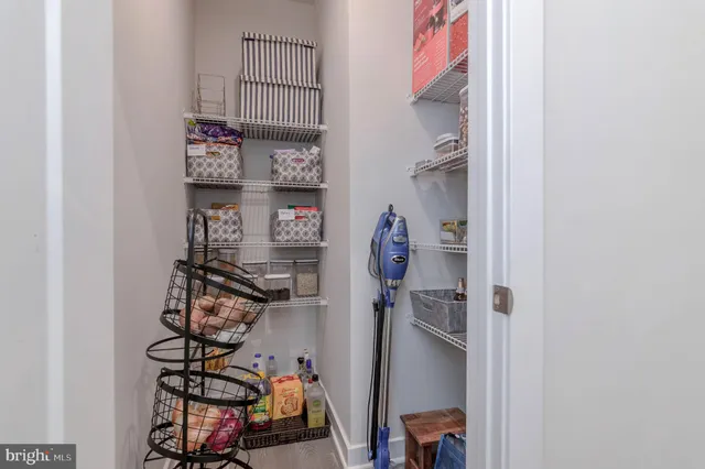 a view of a lake with houses in the back