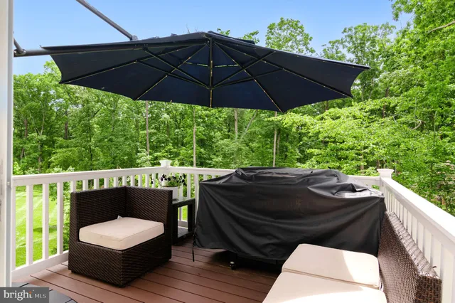 a view of a lake with houses in the back