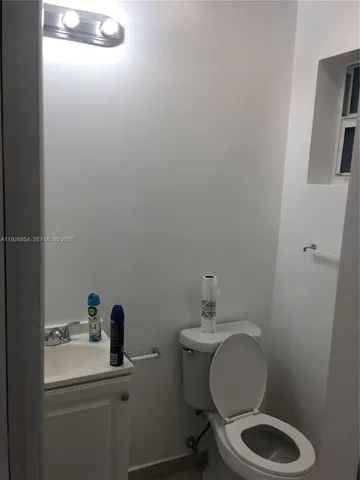 a bathroom with a toilet