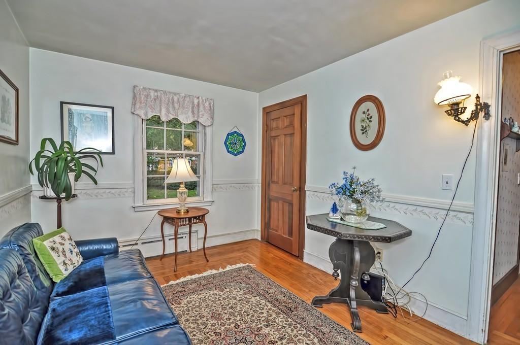 7 Rosedale Drive Bristol, RI 02809 - Photo 13 of 23 a living room with furniture and a table