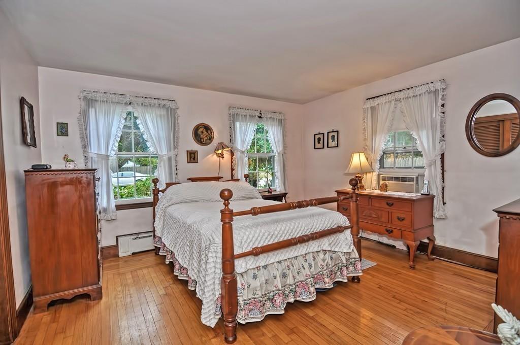 7 Rosedale Drive Bristol, RI 02809 - Photo 14 of 23 a bed room with a bed and a window