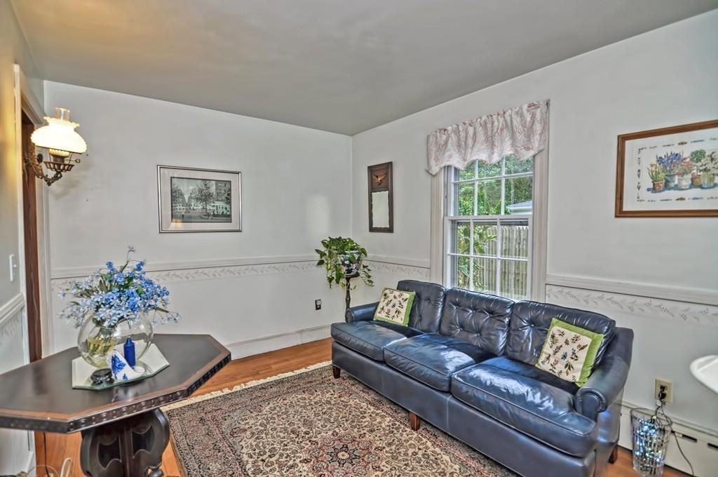 7 Rosedale Drive Bristol, RI 02809 - Photo 17 of 23 a living room with furniture and a potted plant