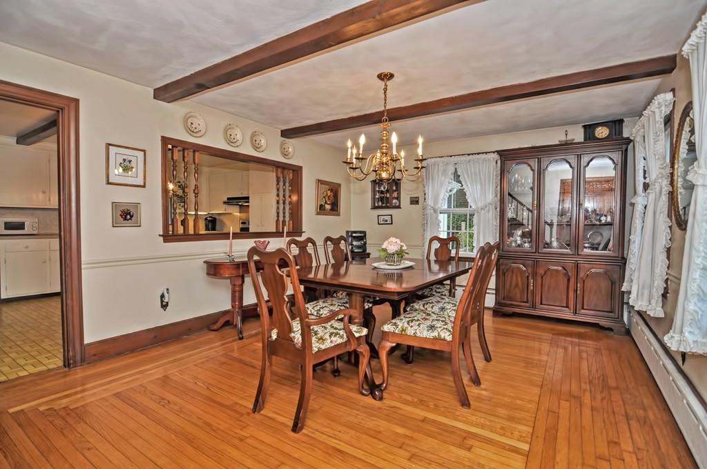7 Rosedale Drive Bristol, RI 02809 - Photo 4 of 23 a view of a dining room with furniture and wooden floor