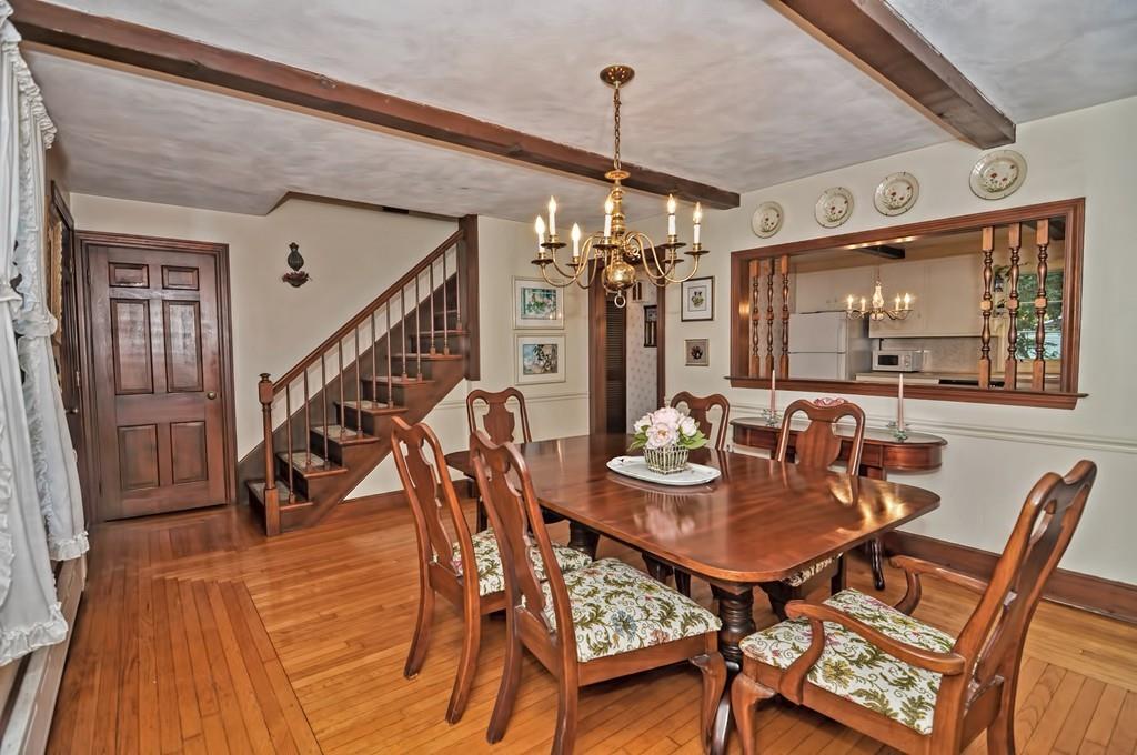 7 Rosedale Drive Bristol, RI 02809 - Photo 6 of 23 a view of a dining room with furniture and wooden floor
