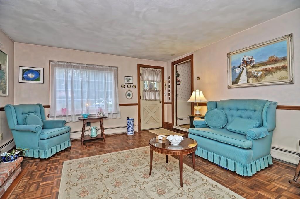 7 Rosedale Drive Bristol, RI 02809 - Photo 8 of 23 a living room with furniture and a window