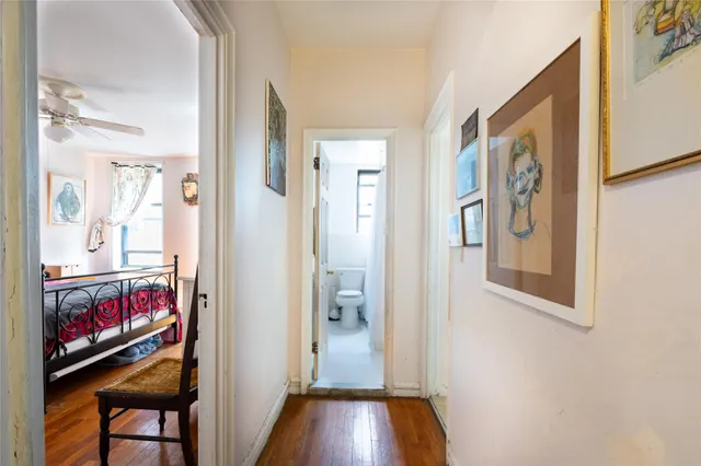 a view of an entryway with wooden floor