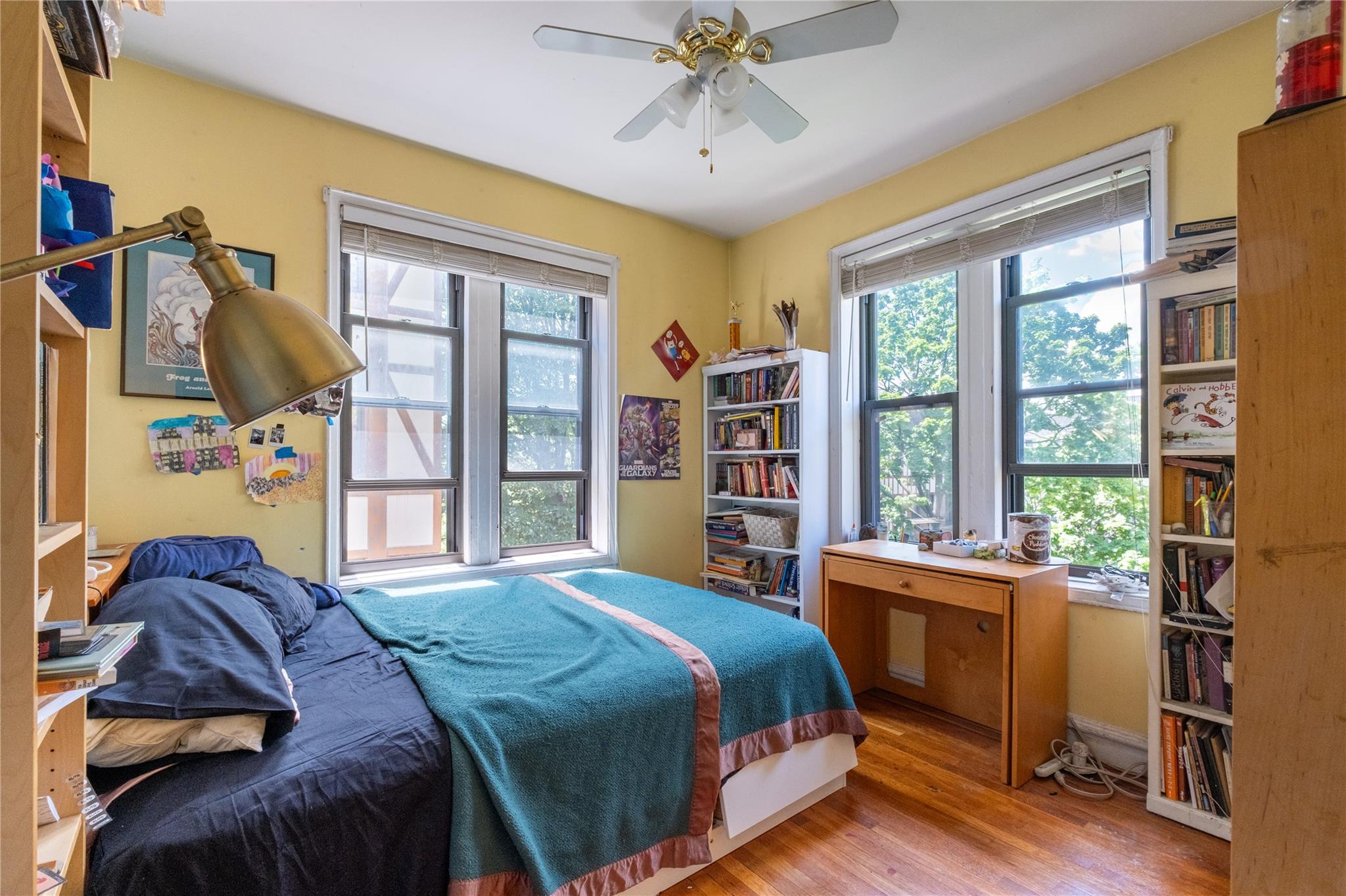 760 Brady Avenue, Unit 417 Bronx, NY 10462 - Photo 23 of 27 a bedroom with a bed and a window