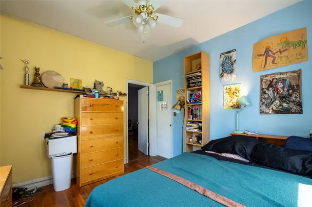 a bedroom with a bed and a view of bathroom