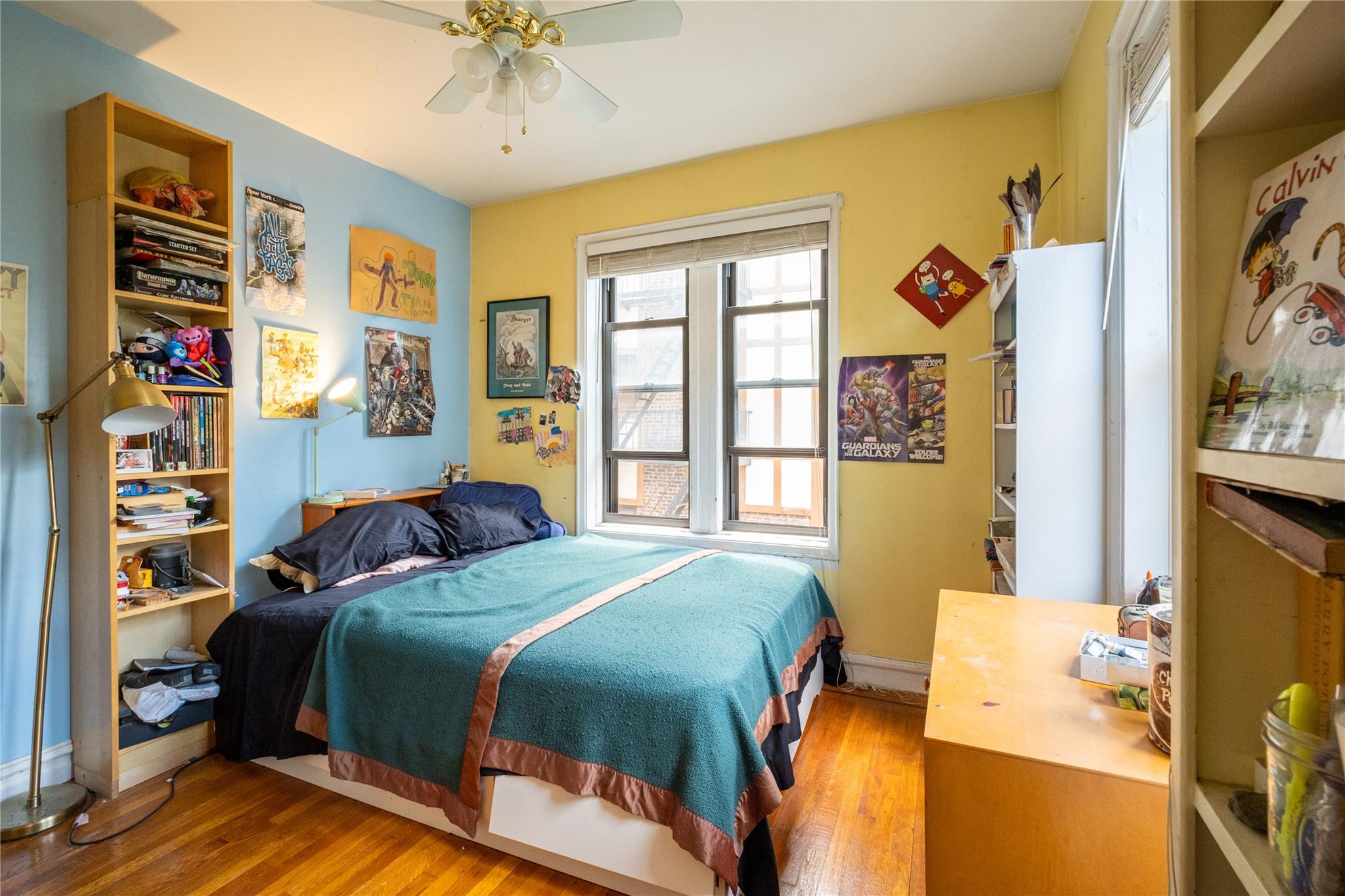 760 Brady Avenue, Unit 417 Bronx, NY 10462 - Photo 25 of 27 a bedroom with a bed and a window