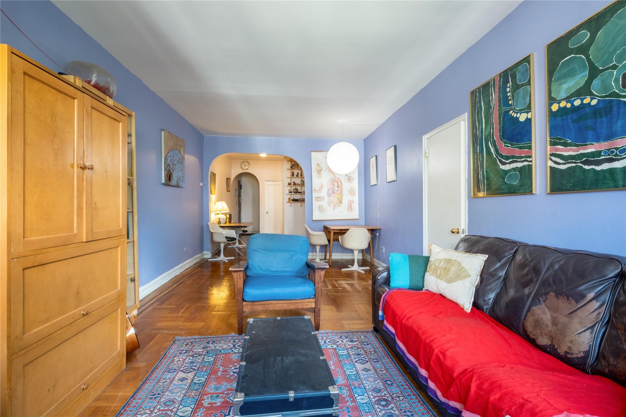 760 Brady Avenue, Unit 417 Bronx, NY 10462 - Photo 10 of 27 a living room with furniture