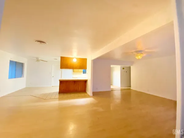 a view of an empty room and window