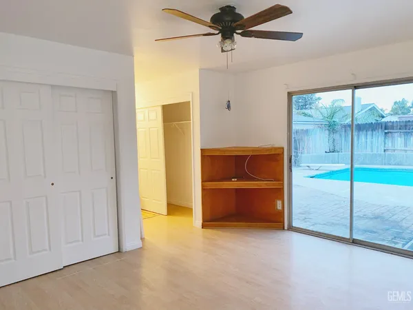 a view of an empty room and window