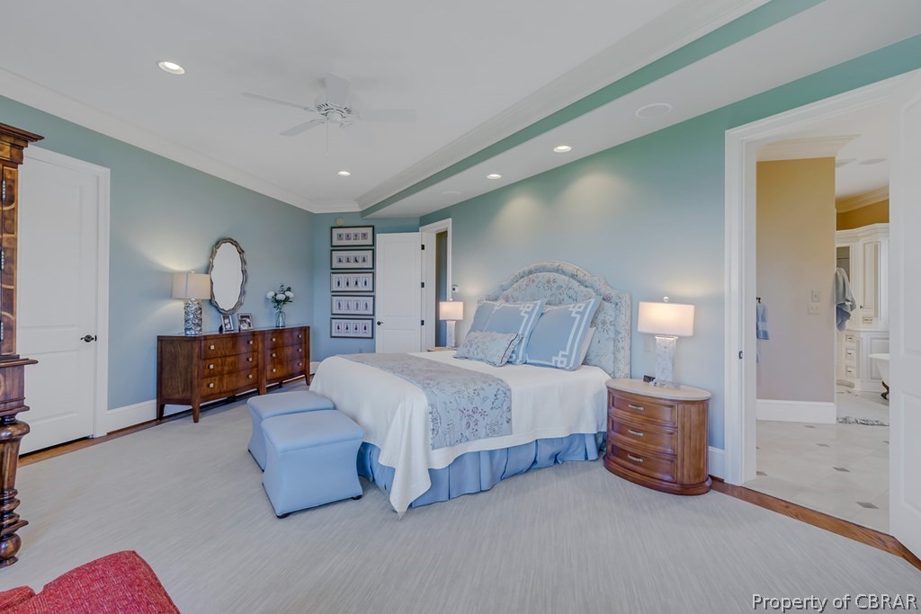 2055 Ditchley Road Kilmarnock, VA 22482 - Photo 27 of 48 Tiled bedroom featuring crown molding, ensuite bathroom, and ceiling fan