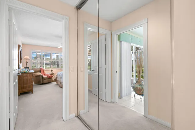 a bedroom with a bed couch and window