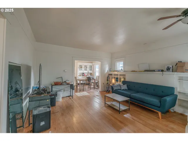 a bedroom with a bed and a mirror