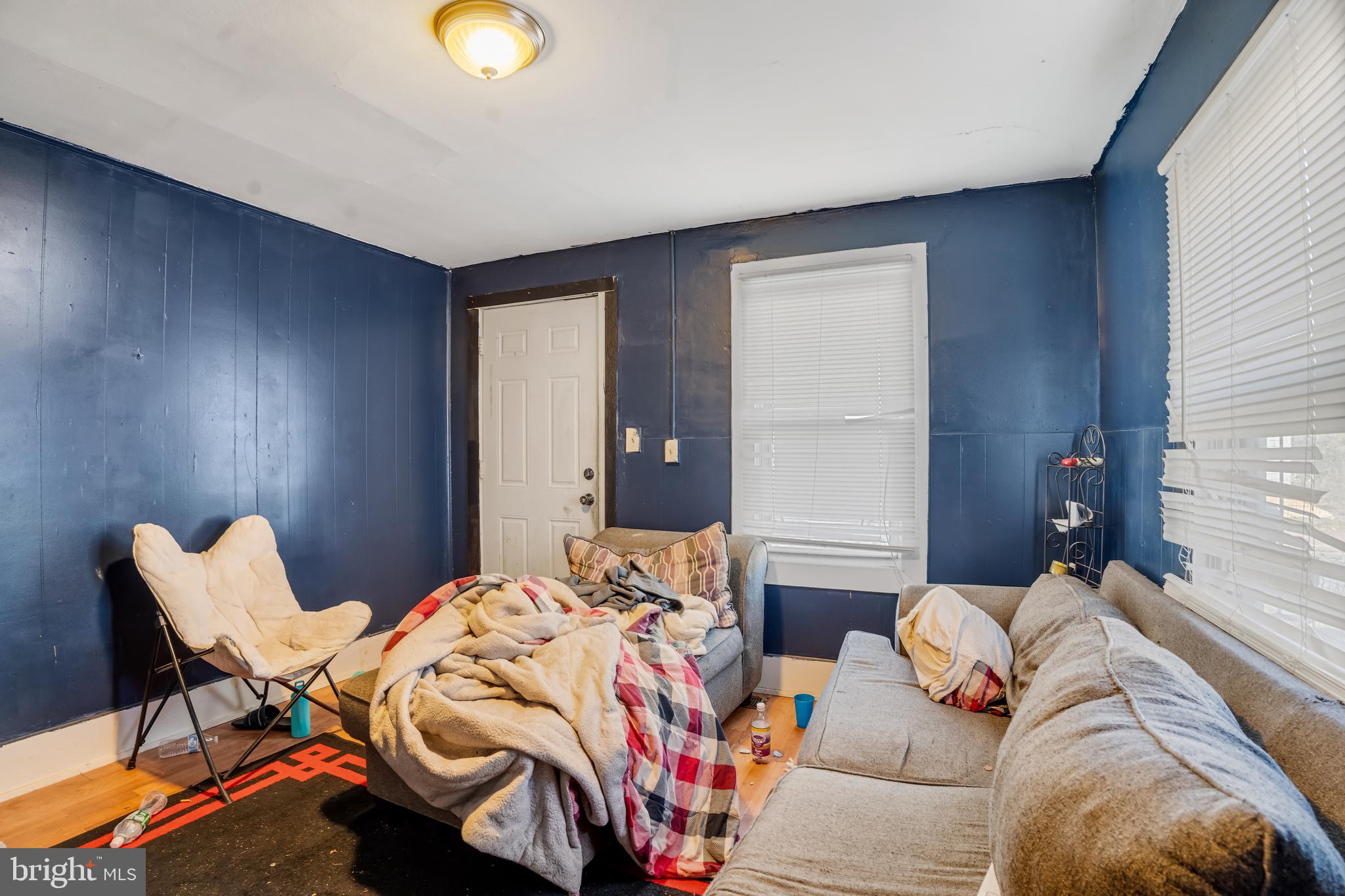 162 7th Street Salem, NJ 08079 - Photo 2 of 5 a bedroom with bed and a window