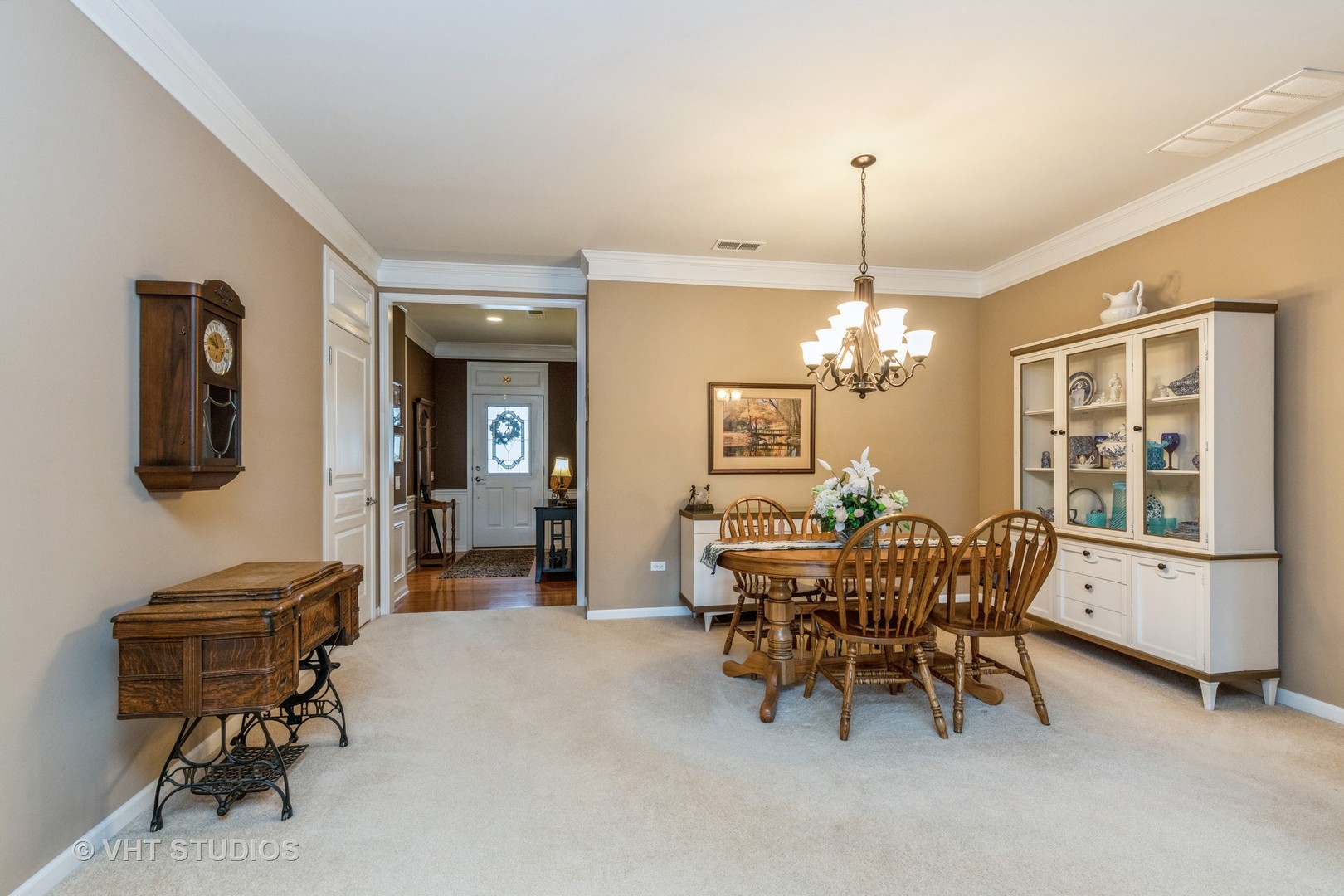 2832 Cascade Falls Circle Elgin, IL 60124 - Photo 15 of 37 a view of a dining room with furniture and chandelier