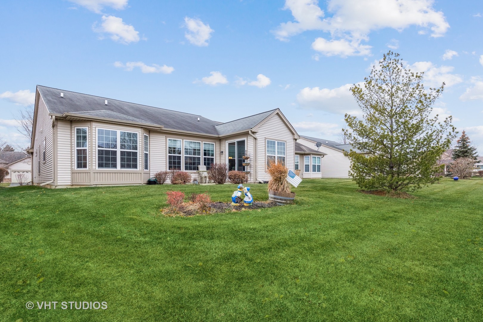 2832 Cascade Falls Circle Elgin, IL 60124 - Photo 23 of 37 a front view of a house with garden and porch