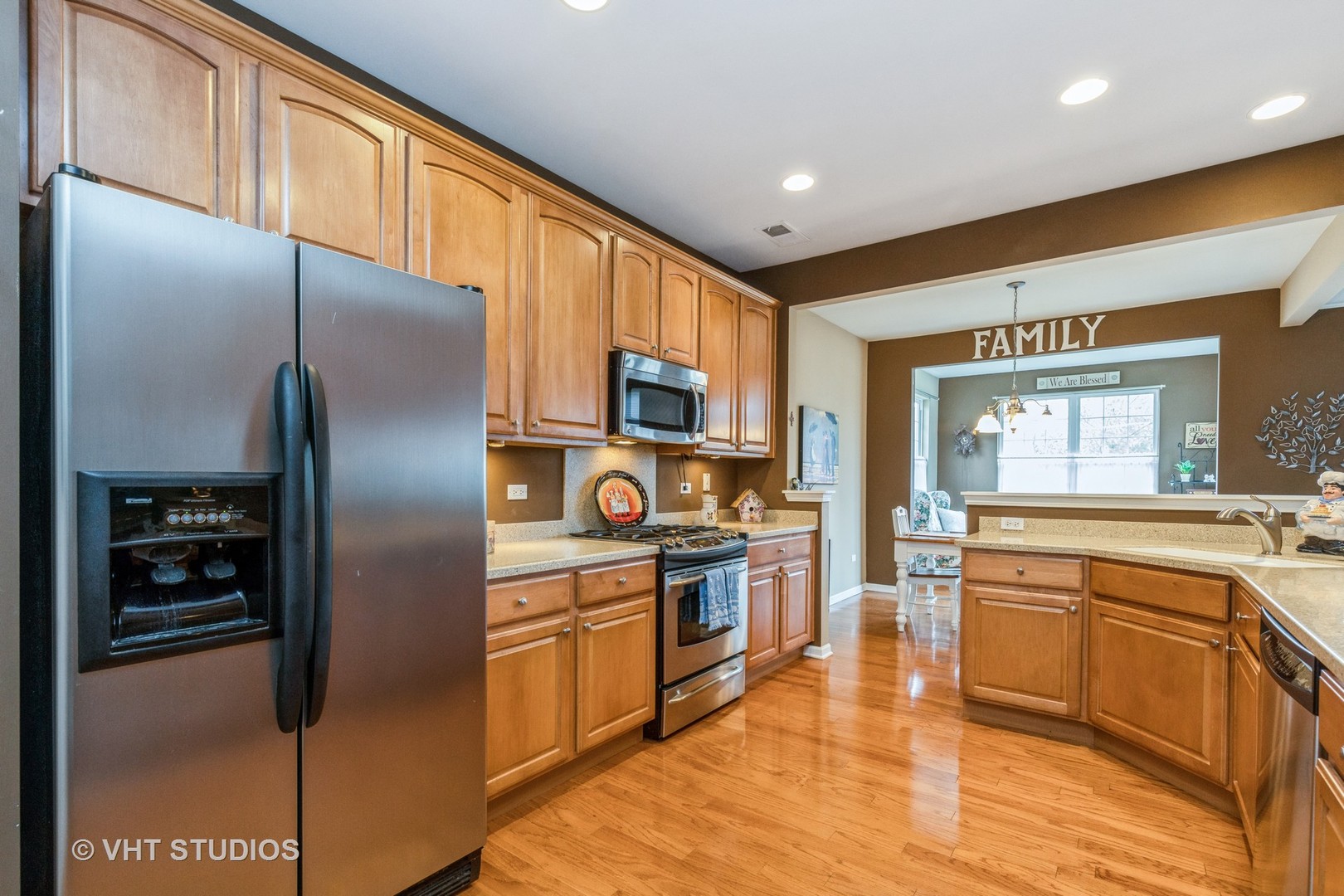 2832 Cascade Falls Circle Elgin, IL 60124 - Photo 8 of 37 a kitchen with stainless steel appliances granite countertop a refrigerator a stove and a sink