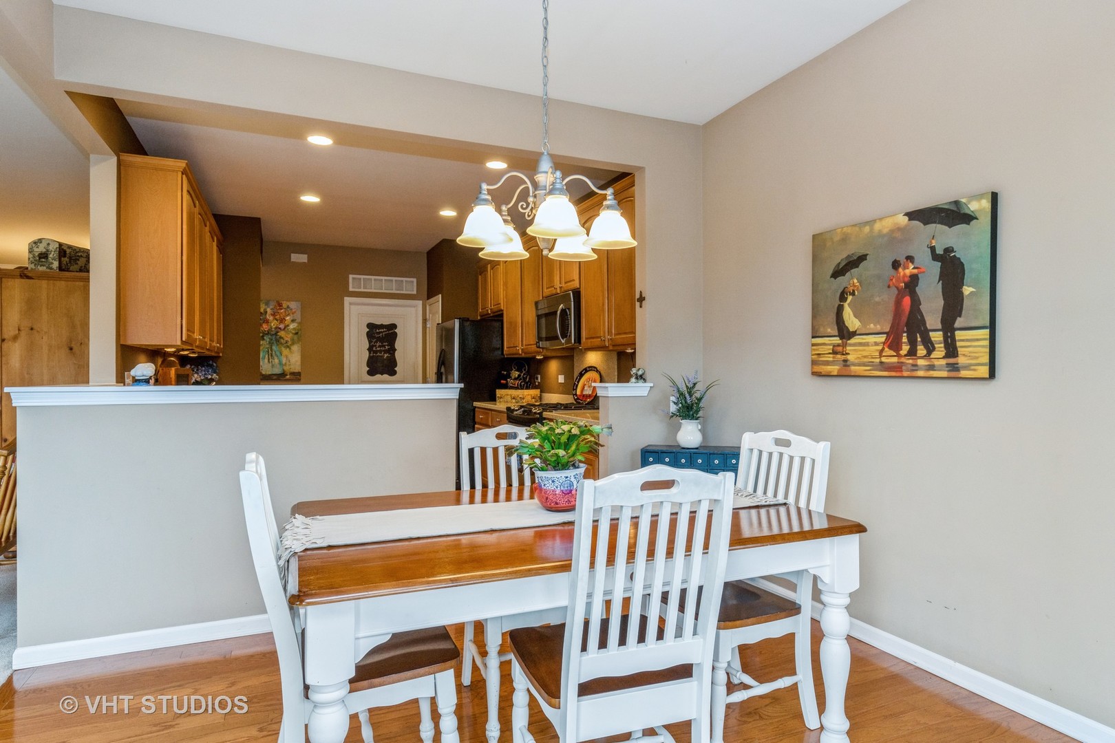 2832 Cascade Falls Circle Elgin, IL 60124 - Photo 10 of 37 a view of a dining room with furniture and a chandelier
