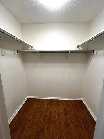 a view of a hallway with a room